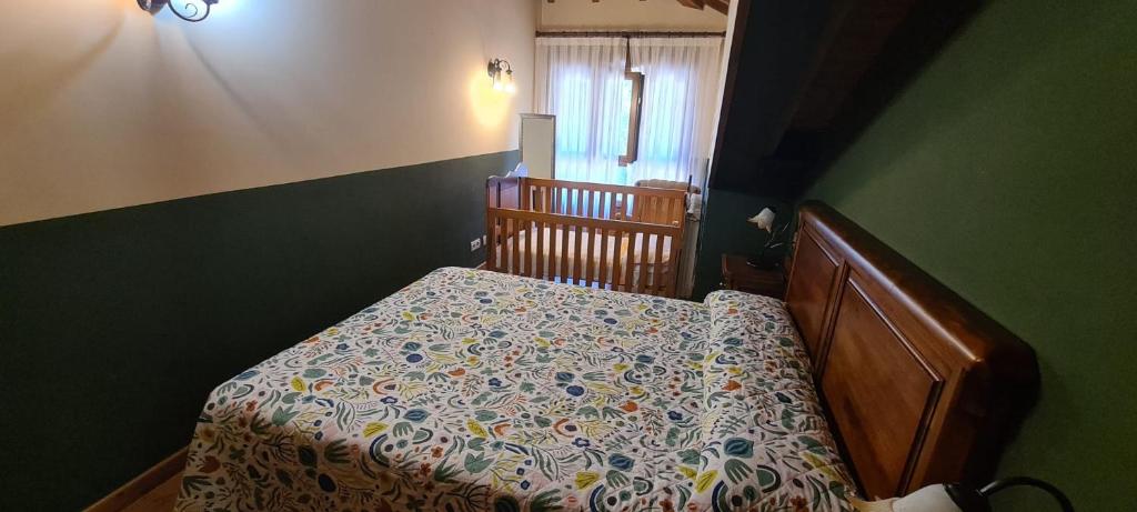 Postel nebo postele na pokoji v ubytování Apartamentos La Corona - Cabrales