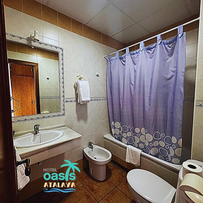 Kúpeľňa v ubytovaní Hotel Oasis Atalaya