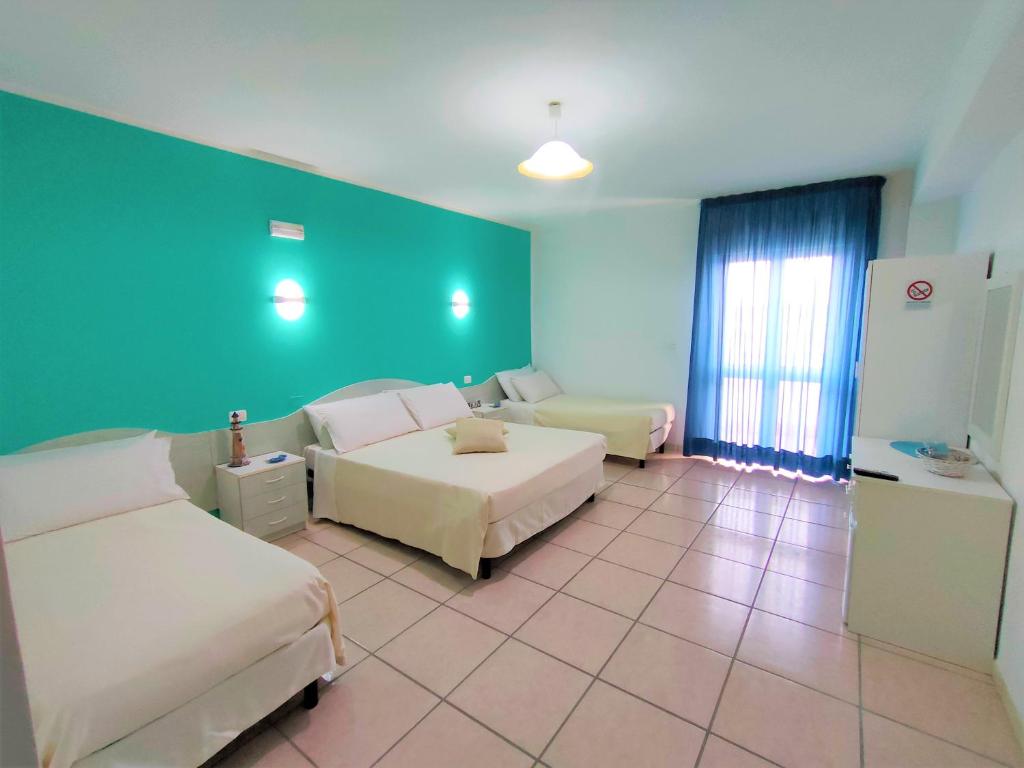 Hotel Baia del Cigno - Habitación Cuádruple De Confort