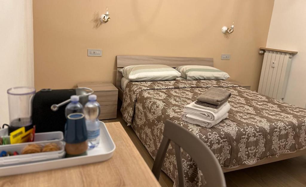 Postel nebo postele na pokoji v ubytování Affittacamere La Quiete