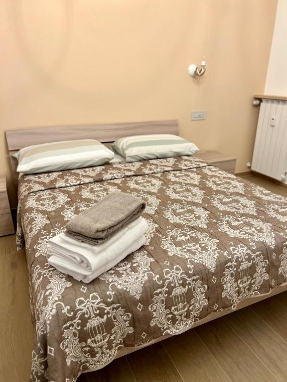 Postel nebo postele na pokoji v ubytování Affittacamere La Quiete