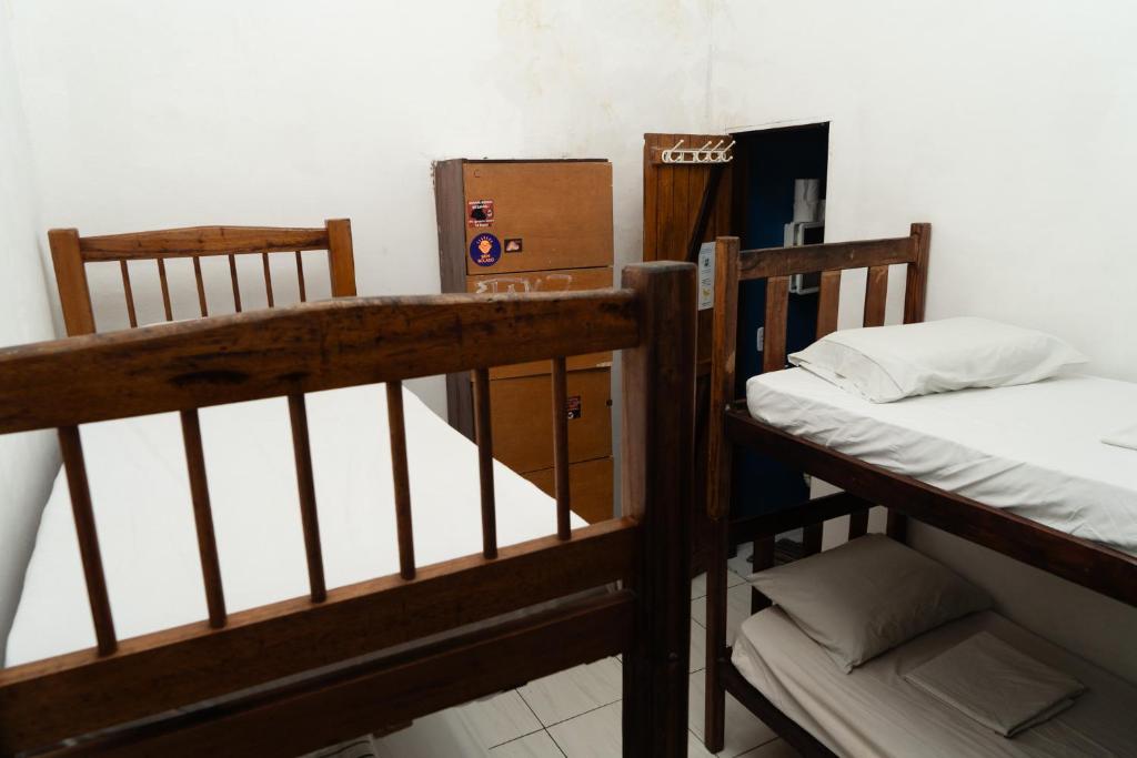 Postel nebo postele na pokoji v ubytování BANANAS HOSTEL