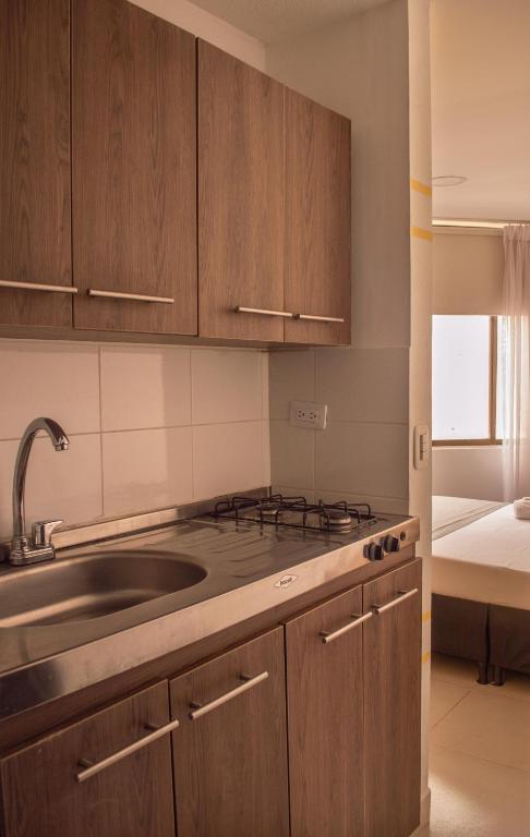 Kuchyň nebo kuchyňský kout v ubytování HOTEl INTER DEL CAFE