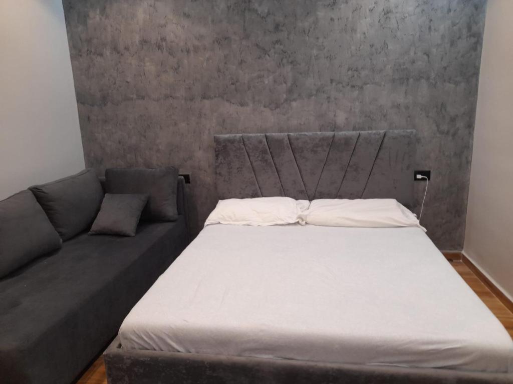 Postel nebo postele na pokoji v ubytování Vila Magis