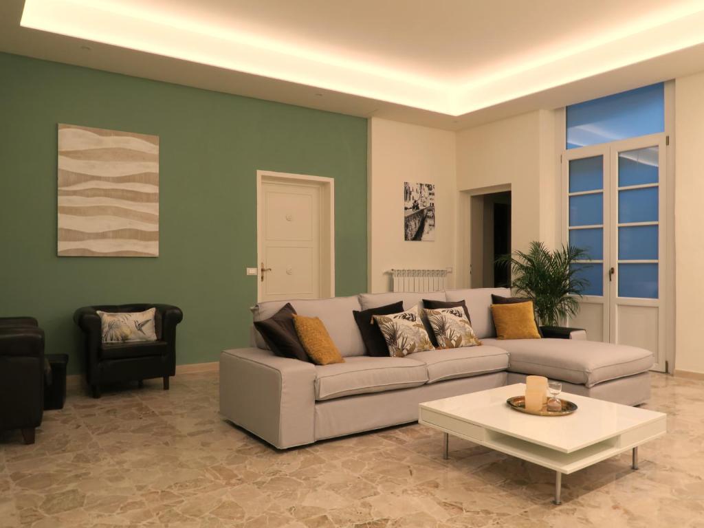 a living room with a couch and a table at La Corticella in Lucca