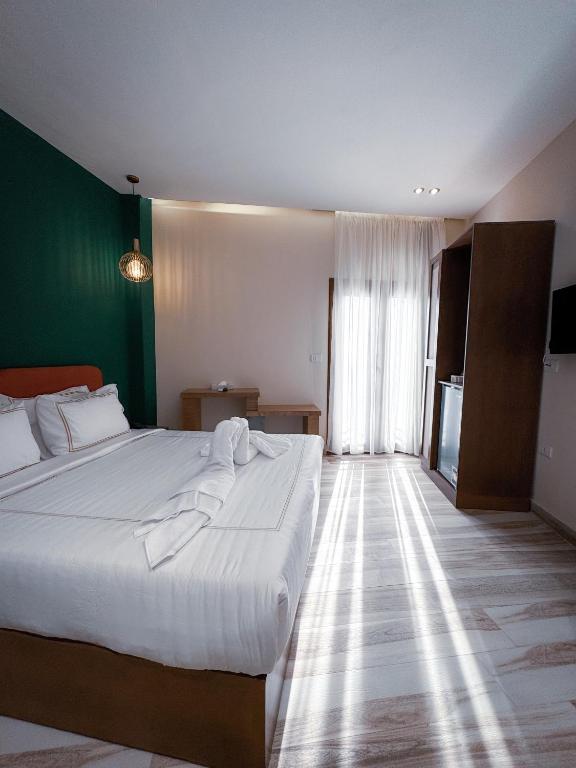 Postel nebo postele na pokoji v ubytování Almas Pyramids View Hotel