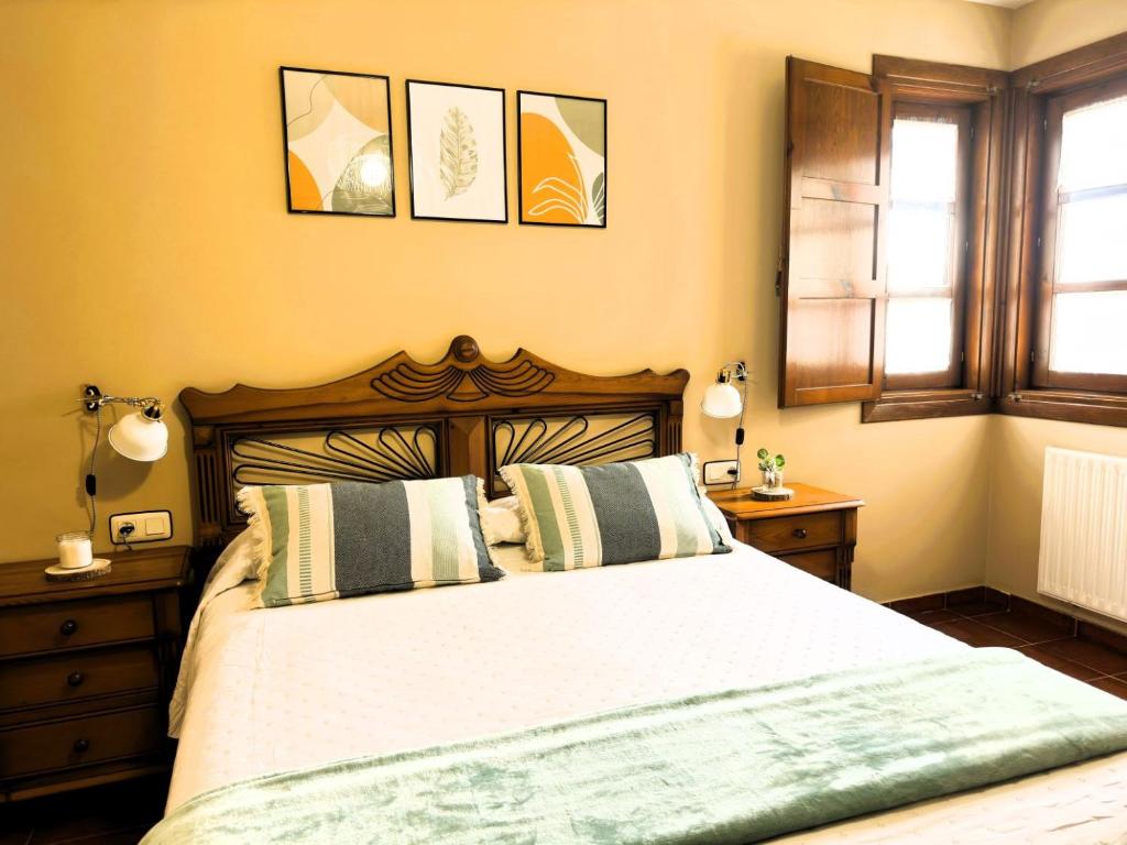 A bed or beds in a room at Los Robles Andrin
