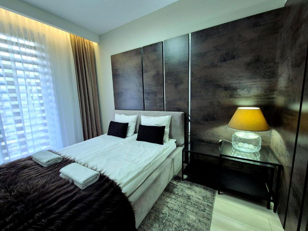 Posteľ alebo postele v izbe v ubytovaní PROPLACE Apartament