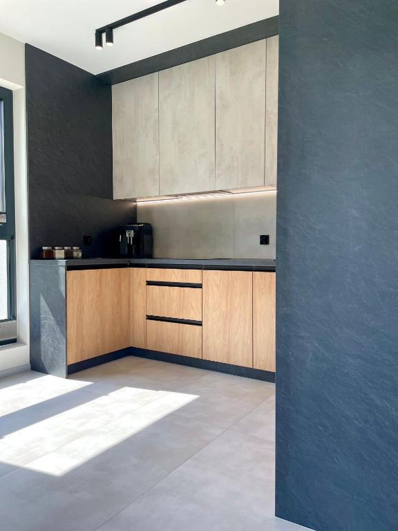 Cucina o angolo cottura di Apartament HORYZONT z widokiem na Jezioro Drwęckie