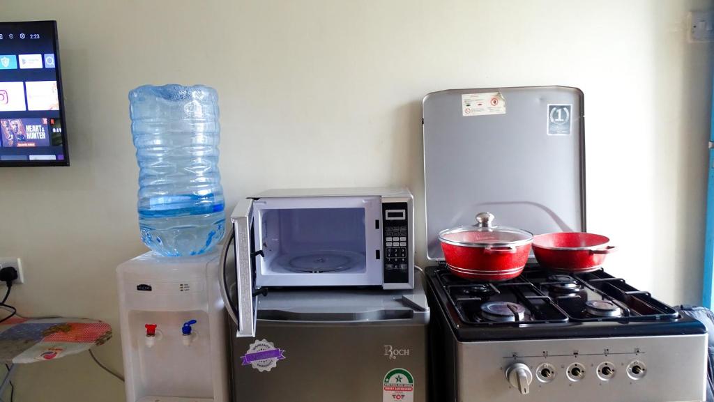 Kuchyň nebo kuchyňský kout v ubytování Nash3 Furnished Studio- CBD Nakuru