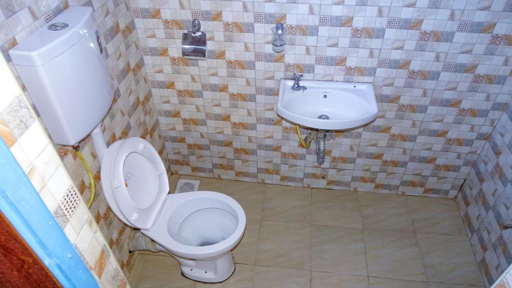 Koupelna v ubytování Nash3 Furnished Studio- CBD Nakuru