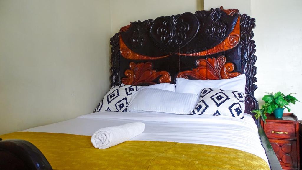 Postel nebo postele na pokoji v ubytování Nash3 Furnished Studio- CBD Nakuru