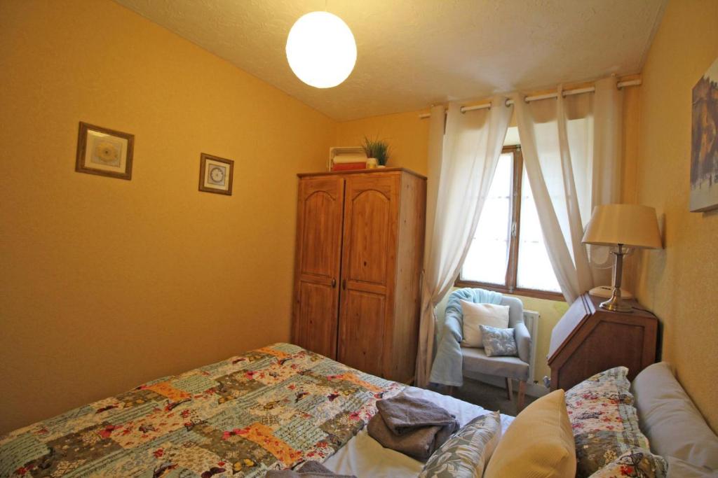Posteľ alebo postele v izbe v ubytovaní Les puits