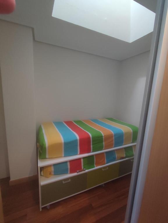 Cama o camas de una habitación en APARTAMENTO EN LINEA DE PLAYA