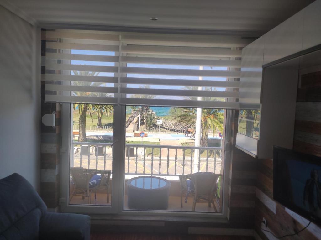 Un balcón o terraza de APARTAMENTO EN LINEA DE PLAYA