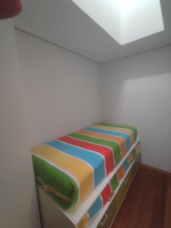 Cama o camas de una habitación en APARTAMENTO EN LINEA DE PLAYA