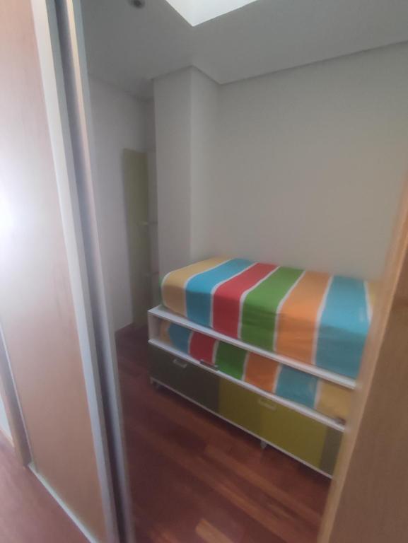 Cama o camas de una habitación en APARTAMENTO EN LINEA DE PLAYA