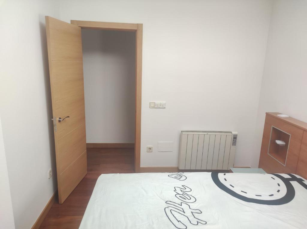 Cama o camas de una habitación en APARTAMENTO EN LINEA DE PLAYA