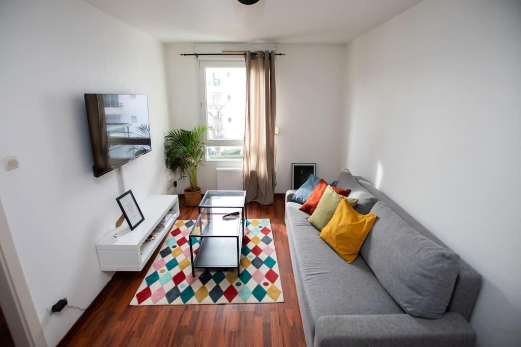 A seating area at Charmant appartement au centre