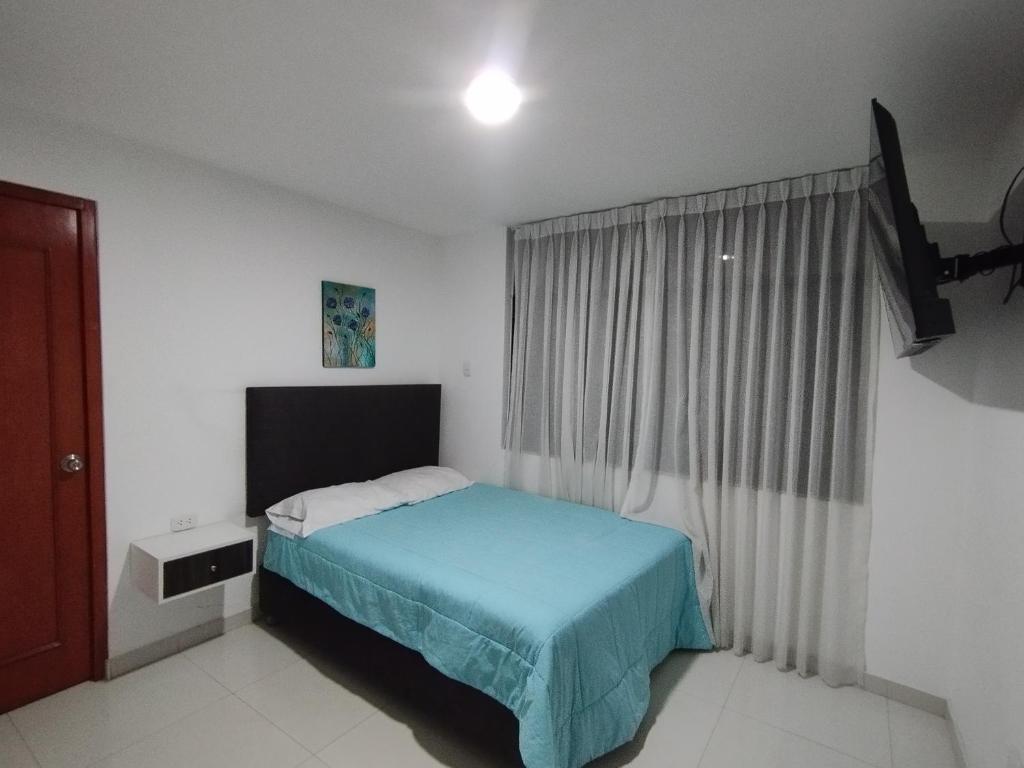 Tempat tidur dalam kamar di ALPHA69