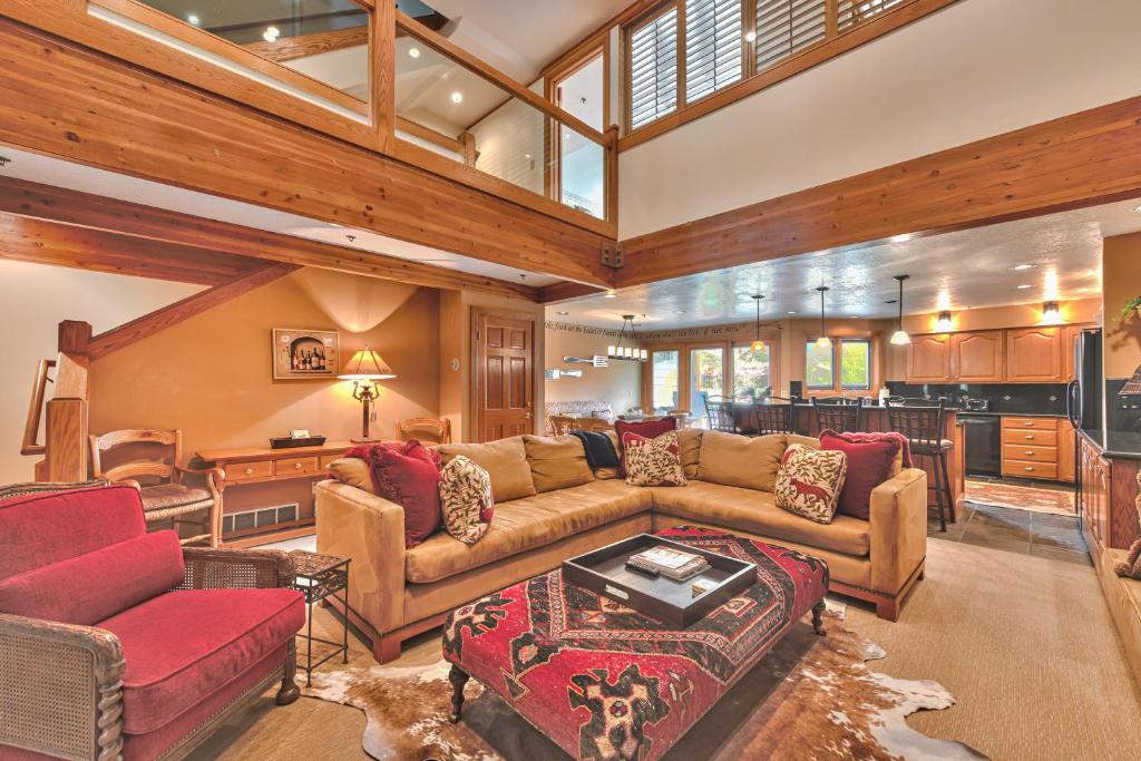 a large living room with a couch and a table at Great Location, Hot Tub & Outdoor Recreation! Deer Valley Fawngrove Terrace in Park City