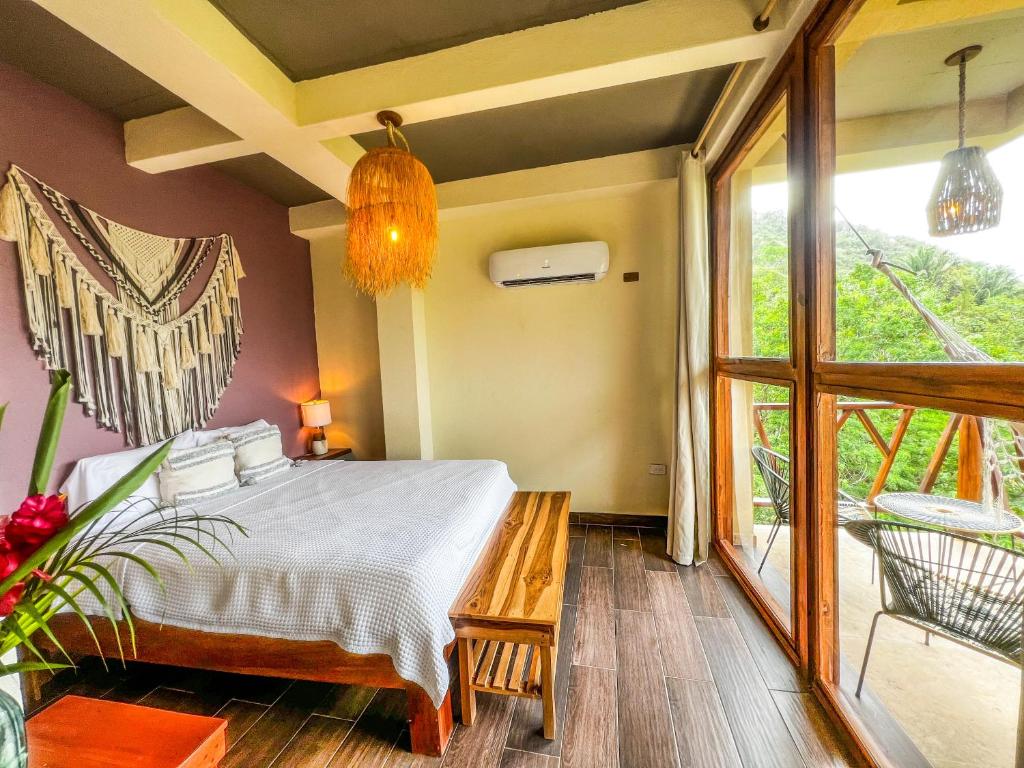 Postel nebo postele na pokoji v ubytování Villa Tayrona