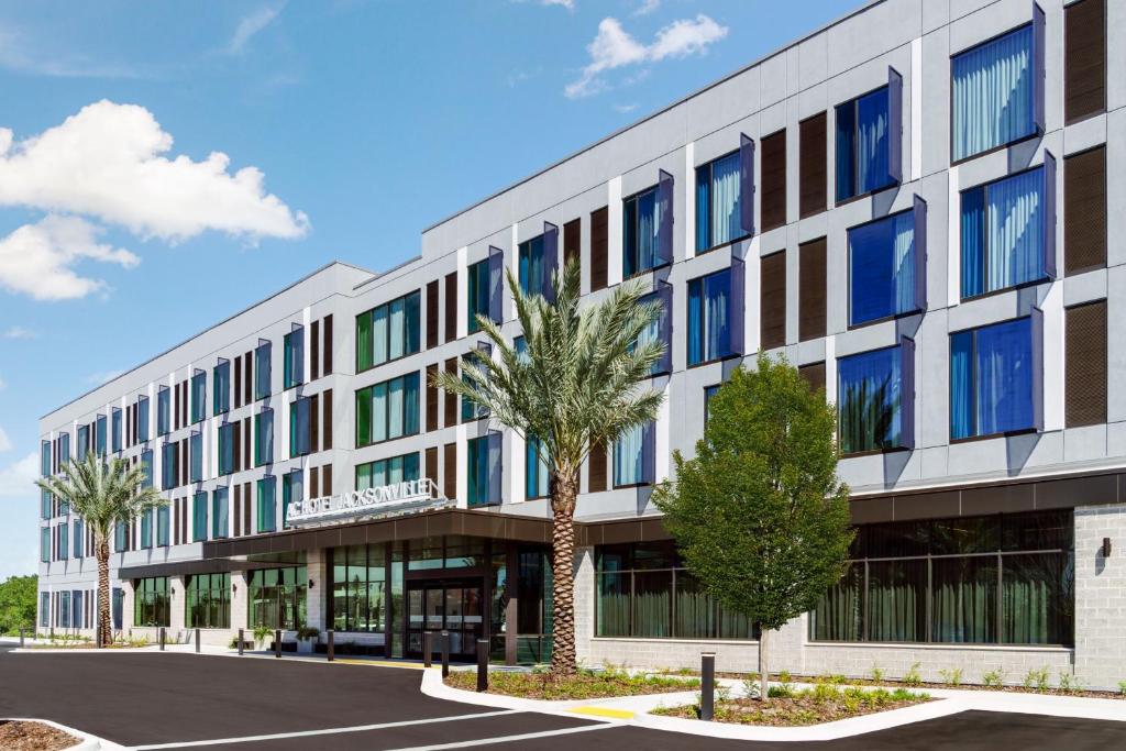 an rendering of the front of the office building at AC Hotel by Marriott Jacksonville St Johns Town Center in Jacksonville