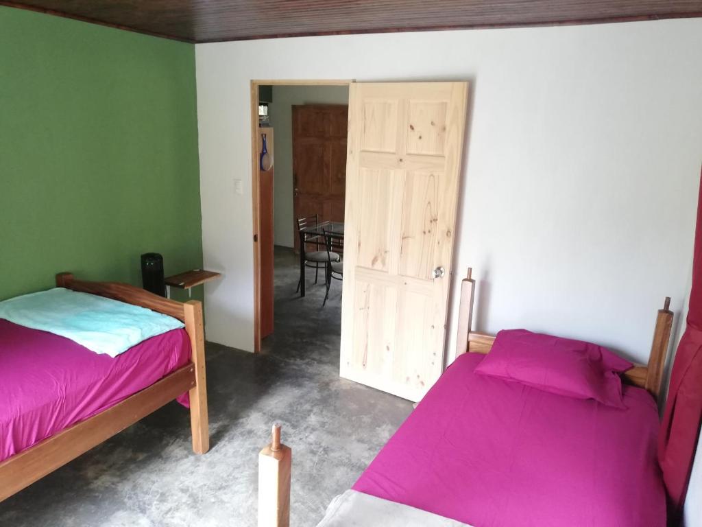 Postel nebo postele na pokoji v ubytování Casa el Colibrí