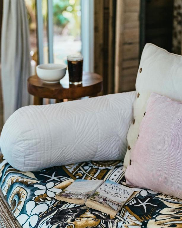Postel nebo postele na pokoji v ubytování Bungalow Bali Hai