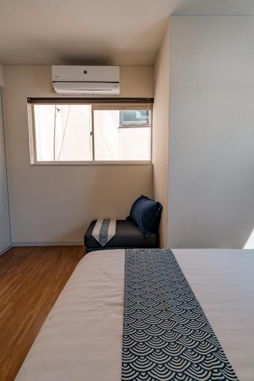 Lova arba lovos apgyvendinimo įstaigoje 【光の屋】「整栋日式一户建」天下茶屋駅徒步4分 難波、道顿堀、関西空港へ直达