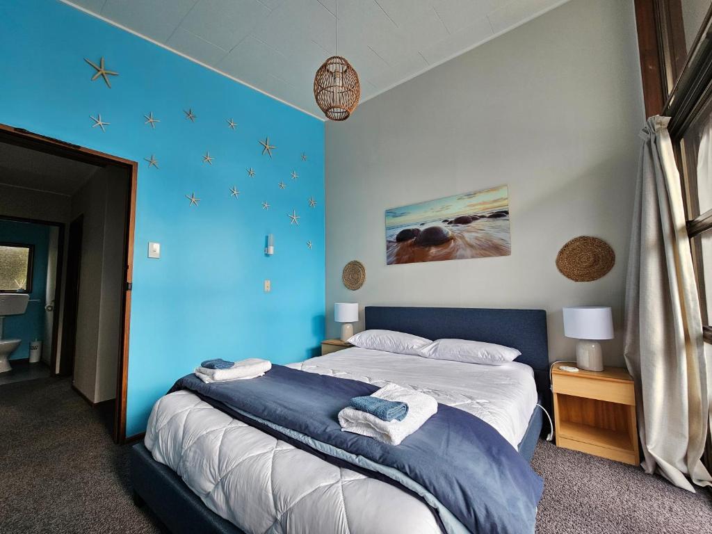 Postel nebo postele na pokoji v ubytování Catlins area accommodation