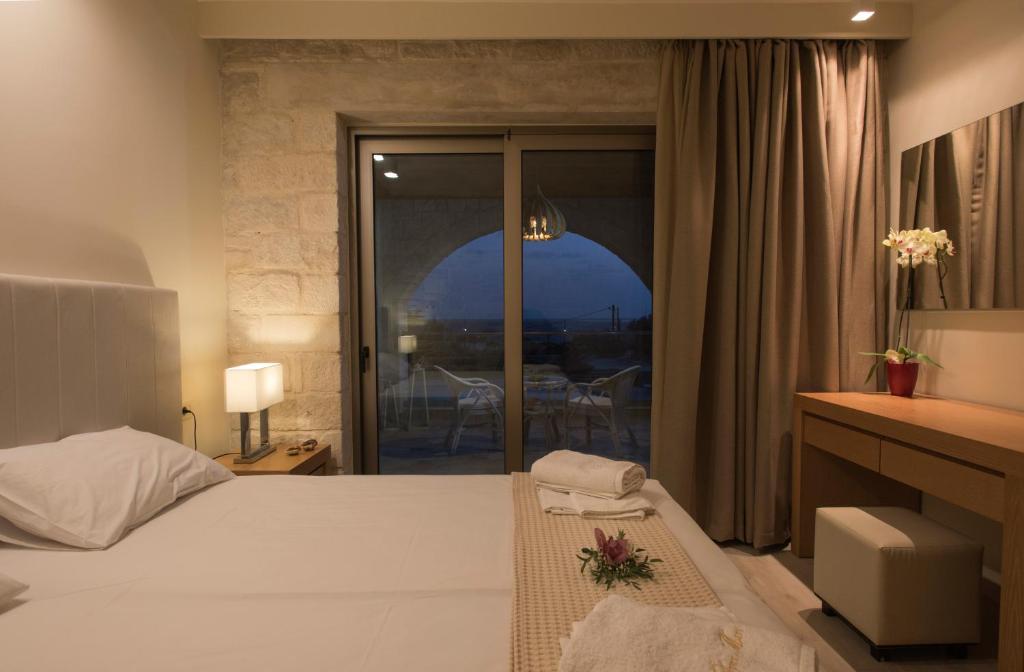 A bed or beds in a room at Libyan Mare