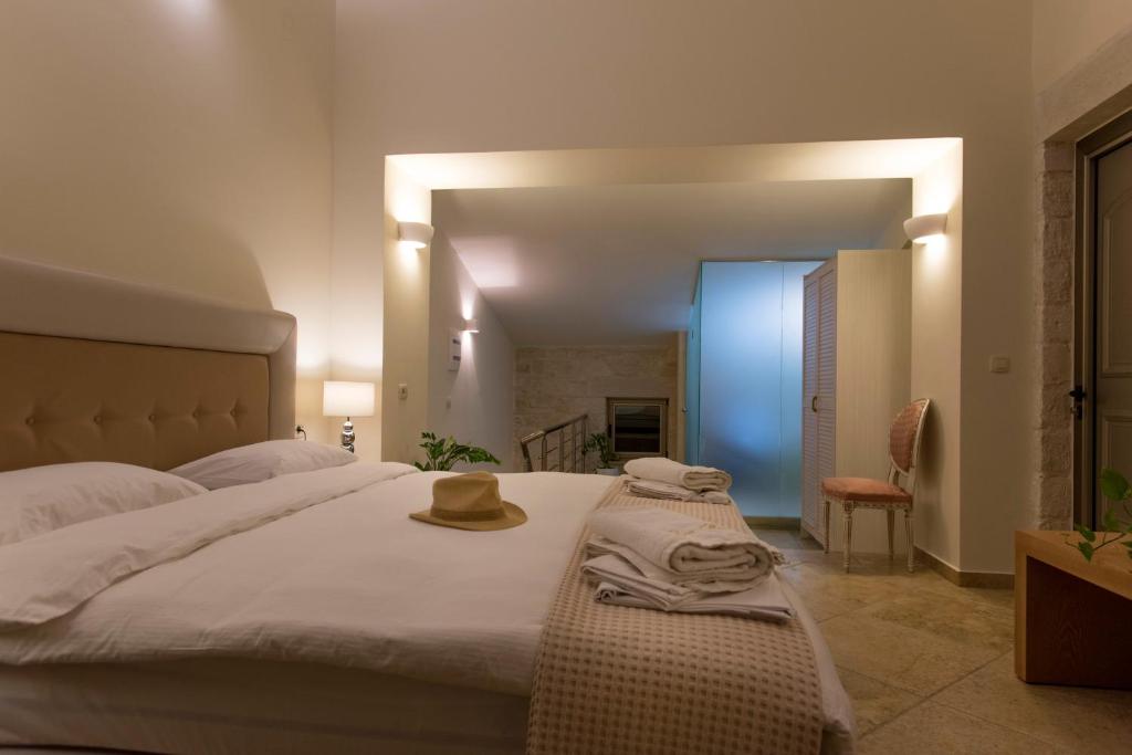 A bed or beds in a room at Libyan Mare