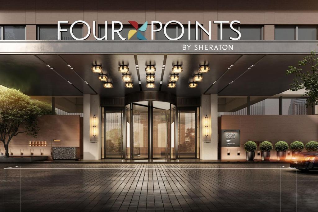 een weergave van de voorkant van een hotel met vier punten bij Four Points by Sheraton Changsha, Tianxin in Changsha