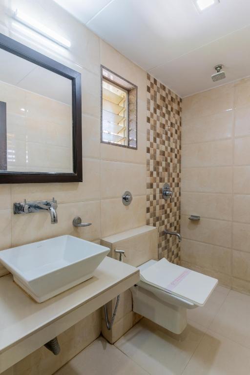 Koupelna v ubytování Hotel Prime