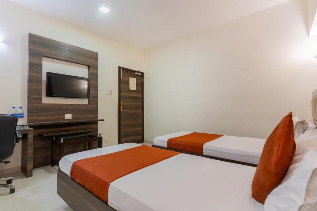 Postel nebo postele na pokoji v ubytování Hotel Prime