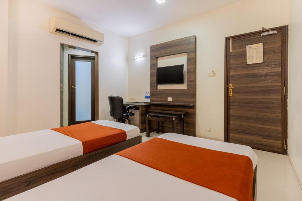 Postel nebo postele na pokoji v ubytování Hotel Prime