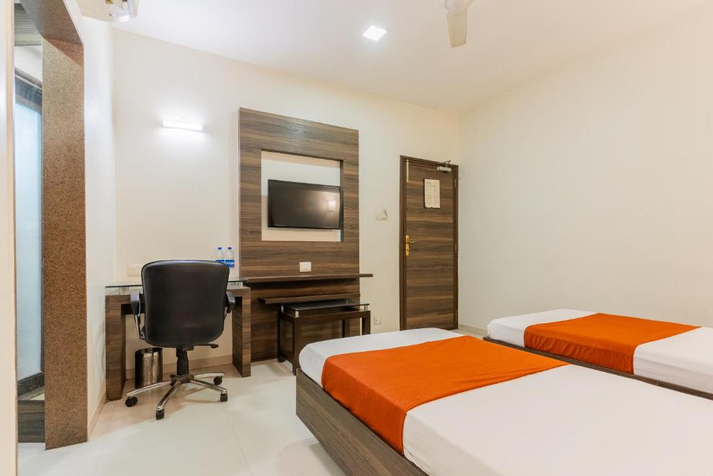 Postel nebo postele na pokoji v ubytování Hotel Prime
