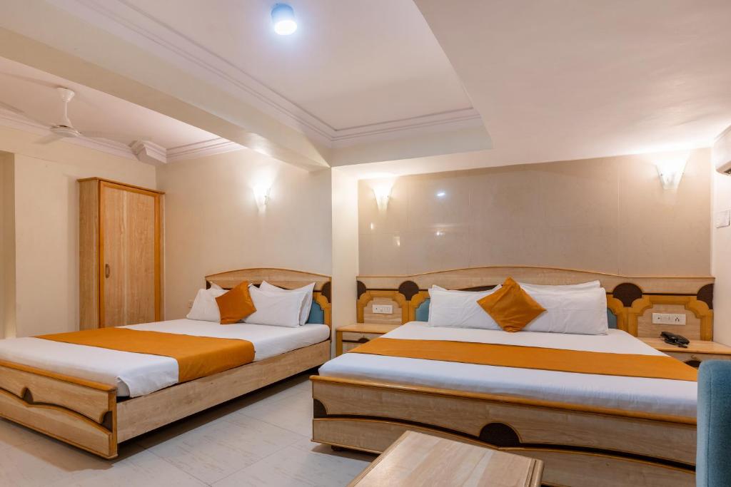 Postel nebo postele na pokoji v ubytování Hotel Prime