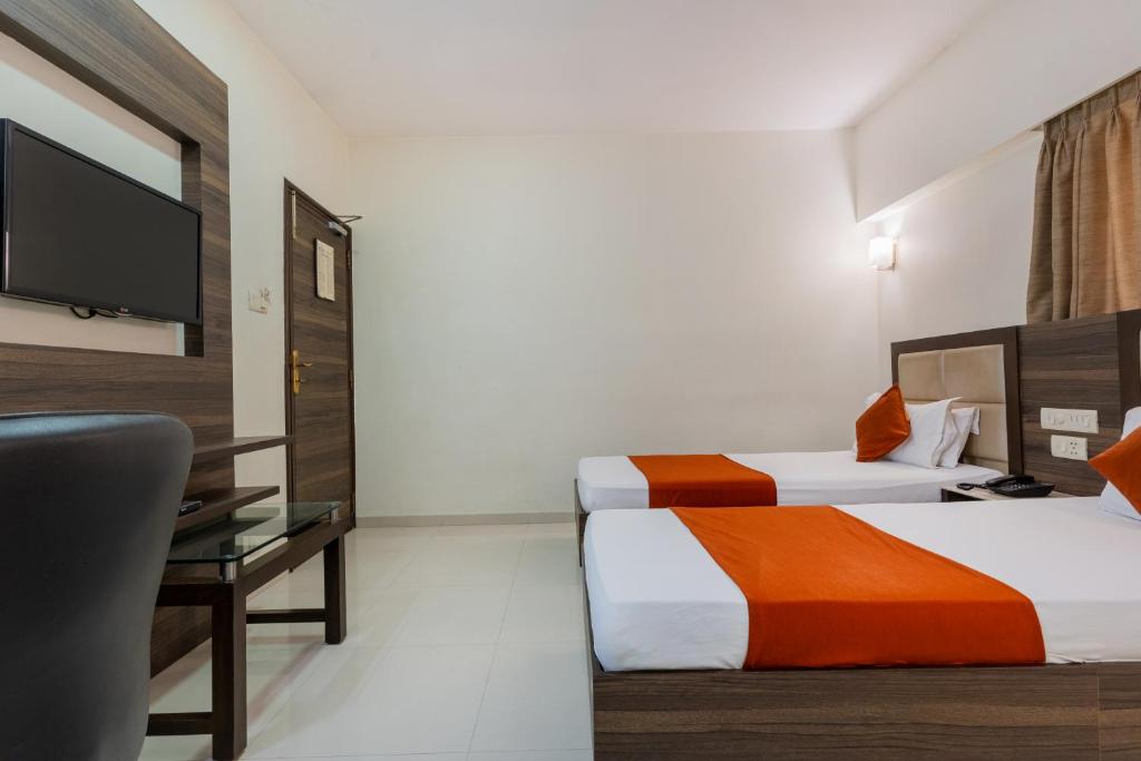 Postel nebo postele na pokoji v ubytování Hotel Prime