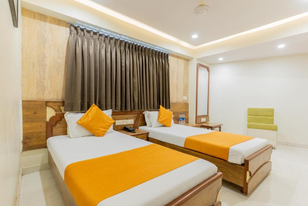 Postel nebo postele na pokoji v ubytování Hotel Prime
