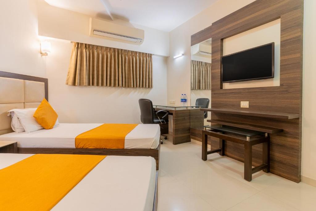 Postel nebo postele na pokoji v ubytování Hotel Prime