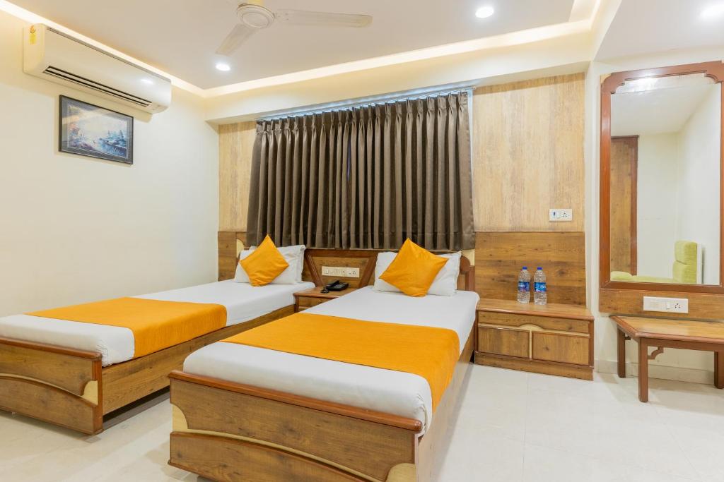 Postel nebo postele na pokoji v ubytování Hotel Prime
