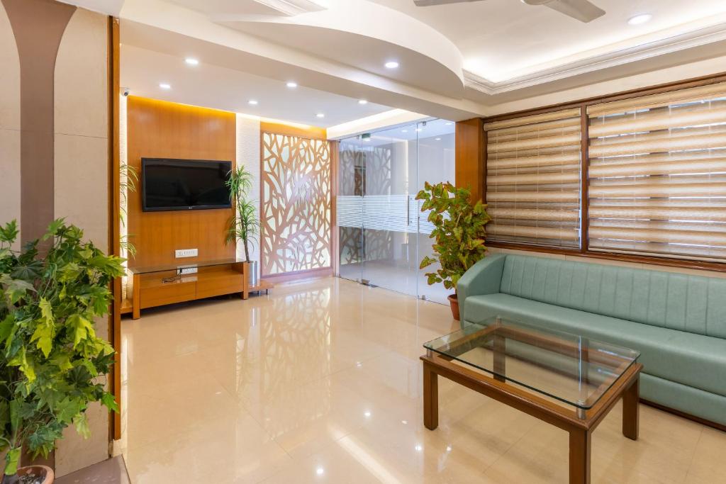 TV a/nebo společenská místnost v ubytování Hotel Prime