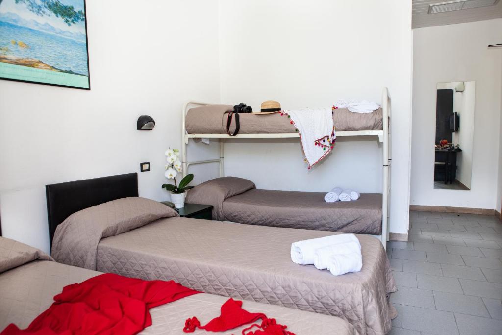 Postel nebo postele na pokoji v ubytování Hotel La Torretta Bramante