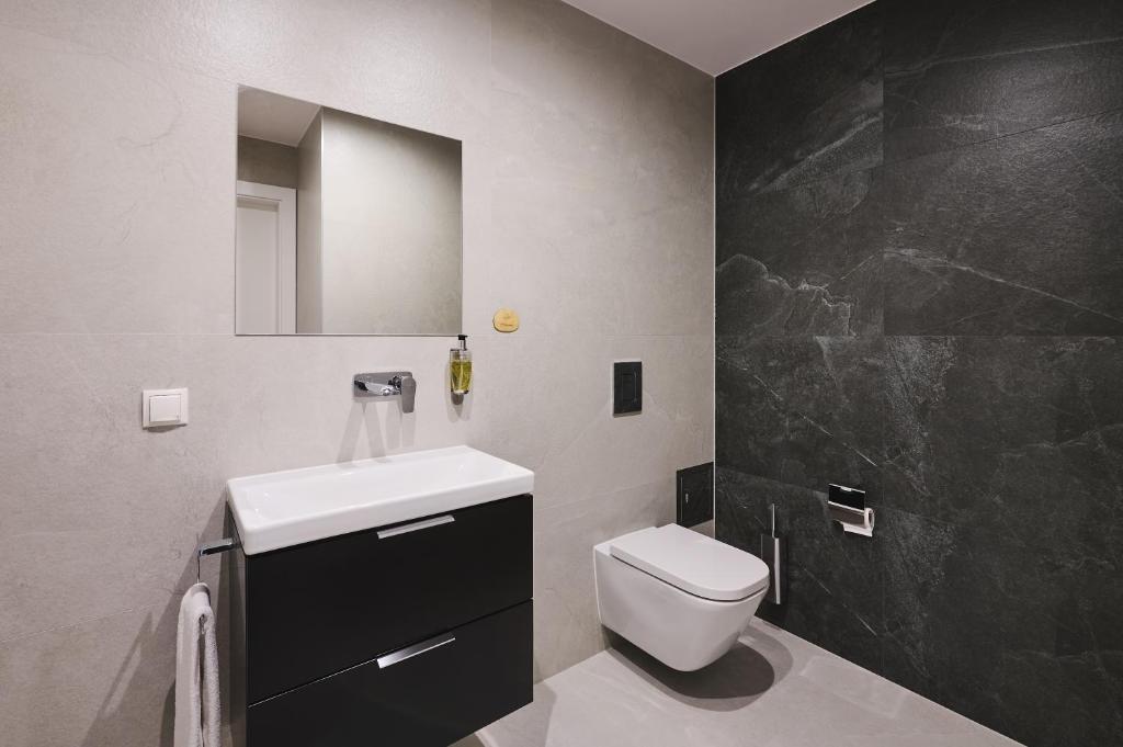 Kúpeľňa v ubytovaní Mamaison Residence Diana