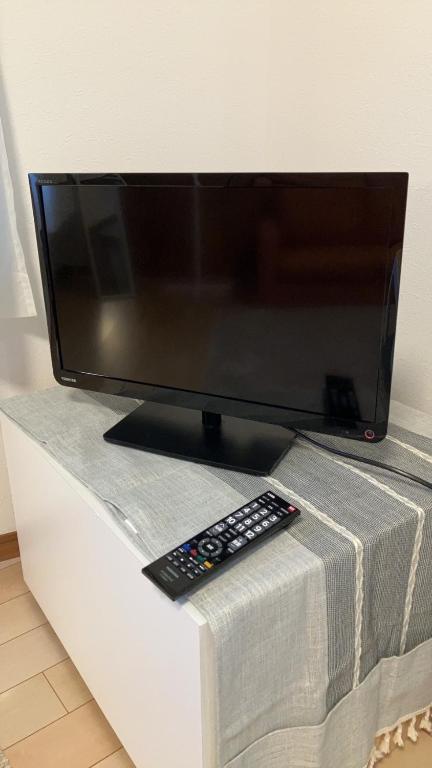 TV a/nebo společenská místnost v ubytování しまの宿 Island Country Inn