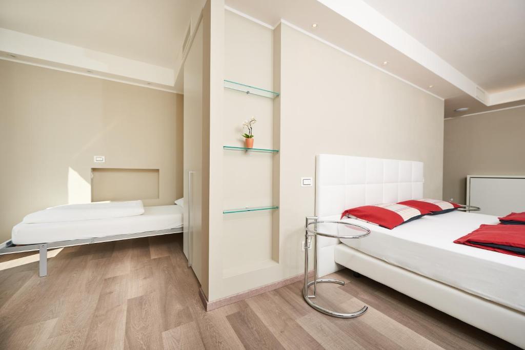 Postel nebo postele na pokoji v ubytování Agriturismo Maso Botes