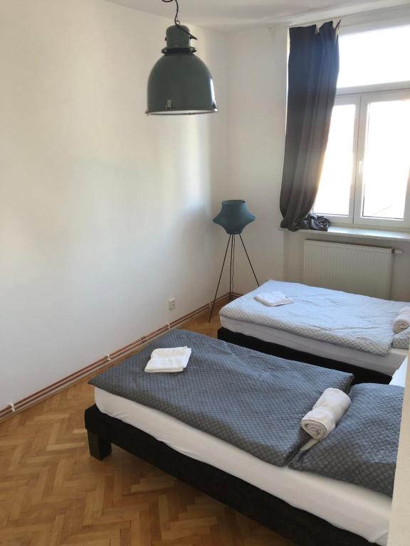 Postel nebo postele na pokoji v ubytování Apartman Kryštof