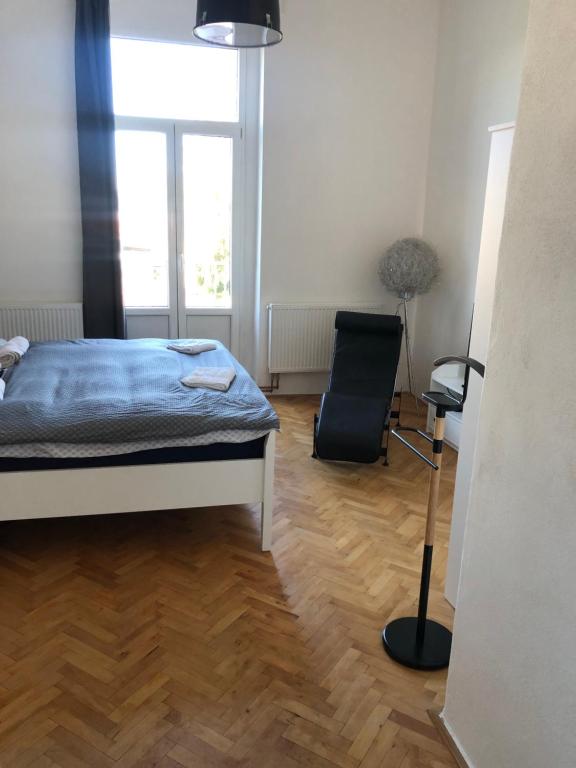 Postel nebo postele na pokoji v ubytování Apartman Kryštof